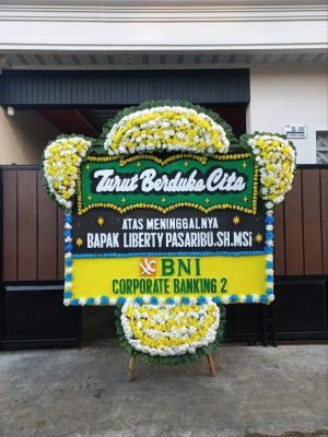 Papan Bunga Duka di Tengkurak