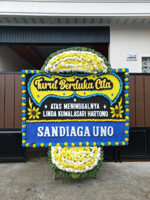 Papan Bunga Duka di Tengkurak