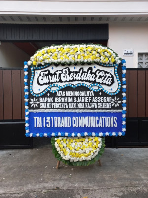 Papan Bunga Duka di Tengkurak